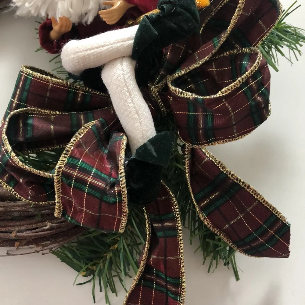 8” grapevine wreath with Santa, ribbon and greenery